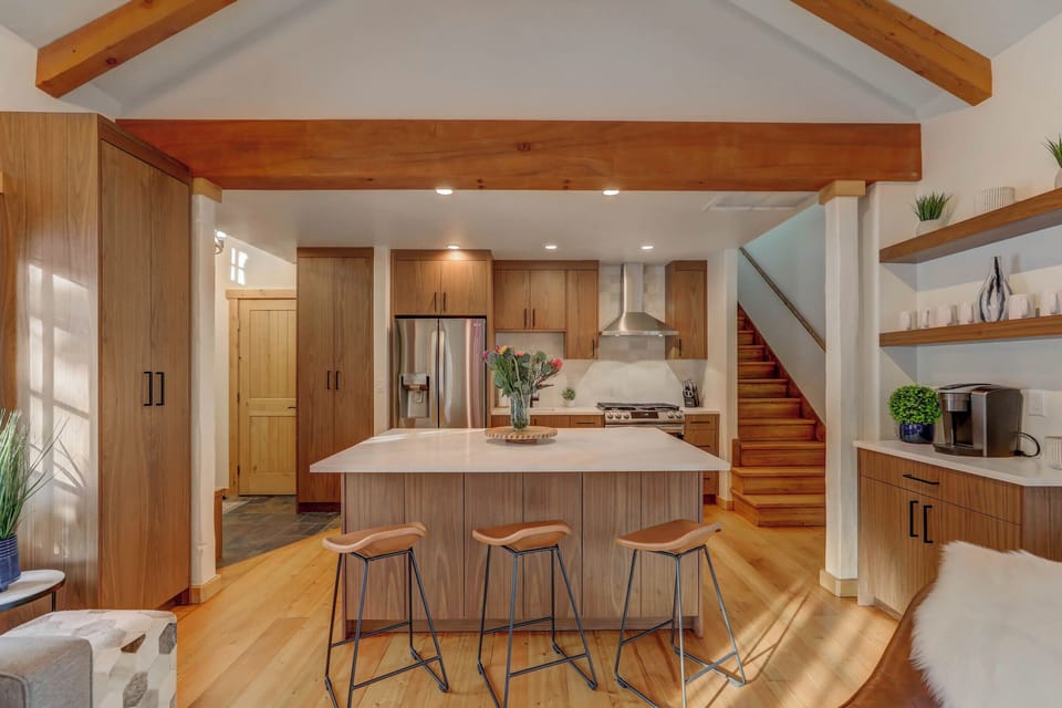We love the addition of the extra cabinetry--you'll appreciate the extra storage space in this thoughtfully remodeled cottage!