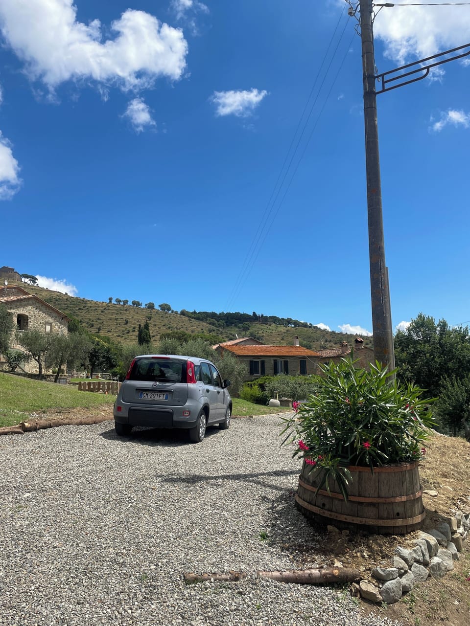 Large lit parking space big enough for 3 cars on land adjacent to the house