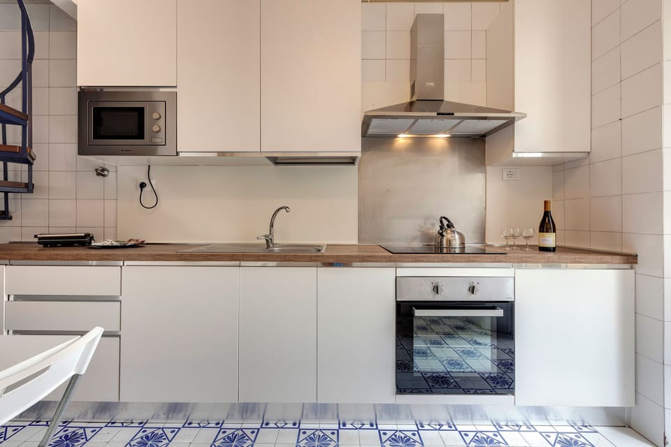 Apartment | Private kitchen | Full-size fridge, microwave, oven, stovetop