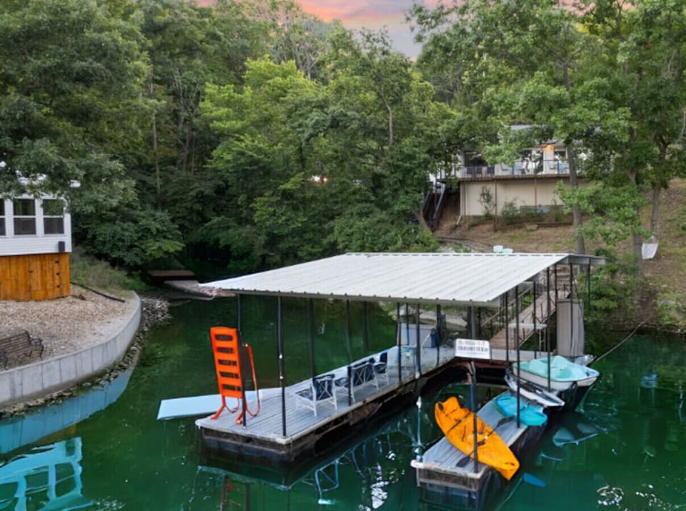 Private dock and boat slip perfect for family time by the water.