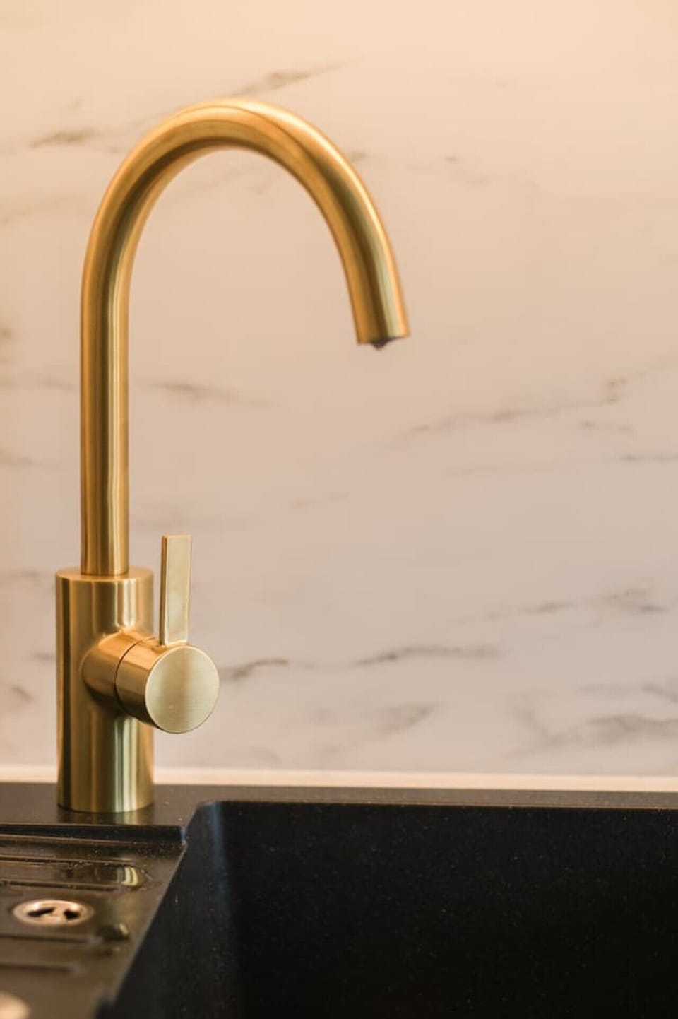 kitchen sink with golden details