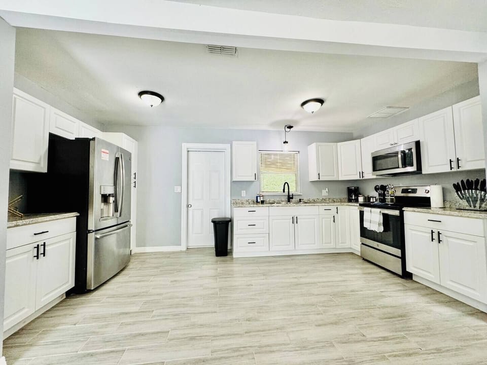Welcome to the kitchen, where delicious dishes are prepared and endless laughter is shared.