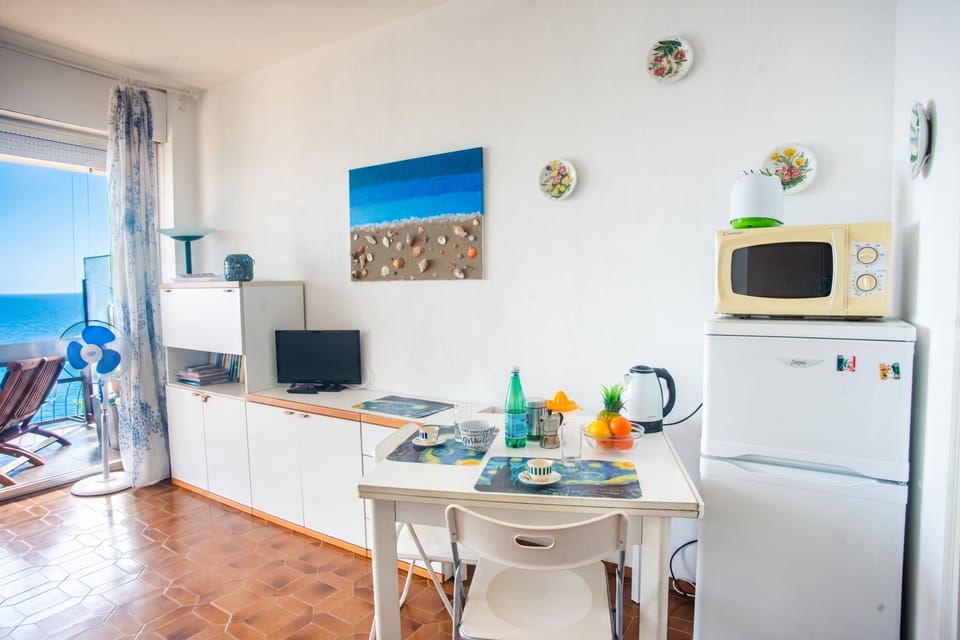 Family Apartment, 1 Bedroom, Balcony (Sole Surf E Relax, Sea-View Balcony) | Private kitchen