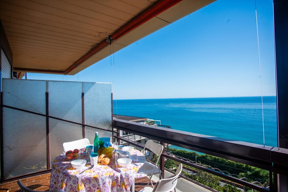 Family Apartment, 1 Bedroom, Balcony (Sole Surf E Relax, Sea-View Balcony) | Outdoor dining