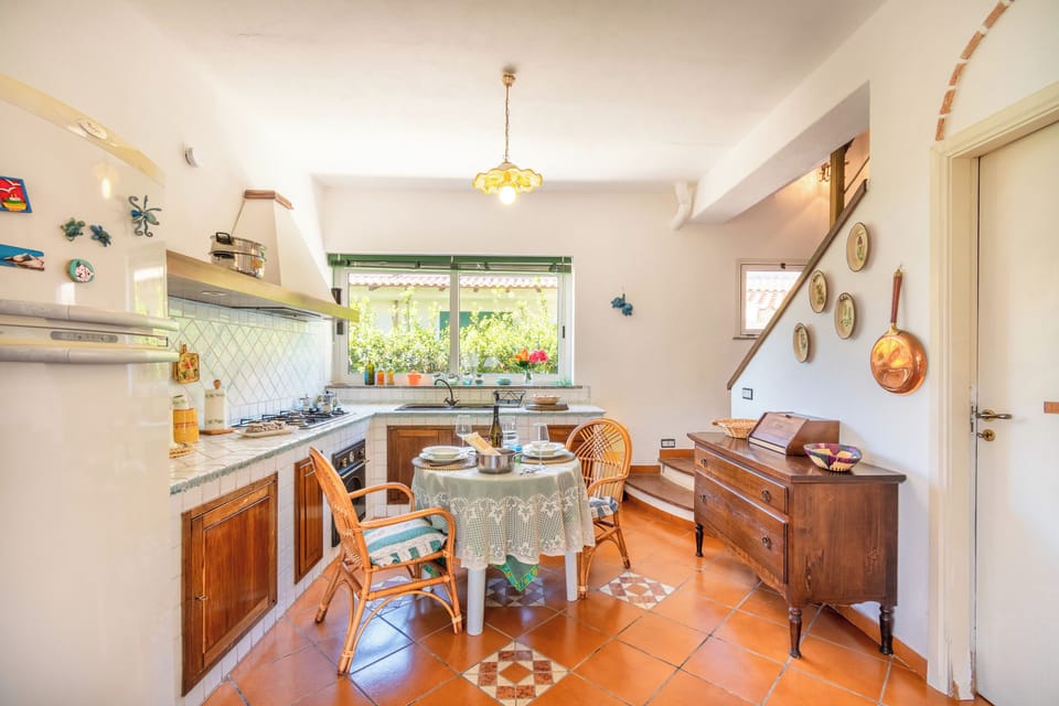 Family Villa, Multiple Bedrooms, 2 Bathrooms (Villa Maria Luisa vista mare,) | Private kitchen | Fridge, microwave, oven, stovetop