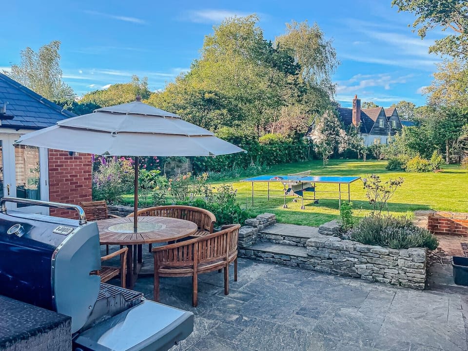 Garden terrace with BBQ and dining area