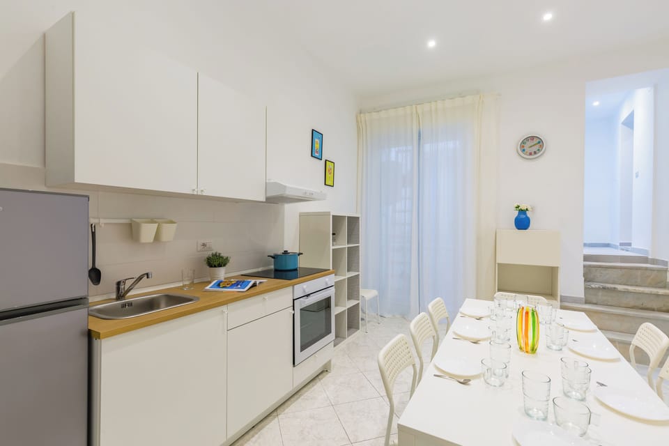 Apartment | Private kitchen | Full-size fridge, oven, stovetop, electric kettle