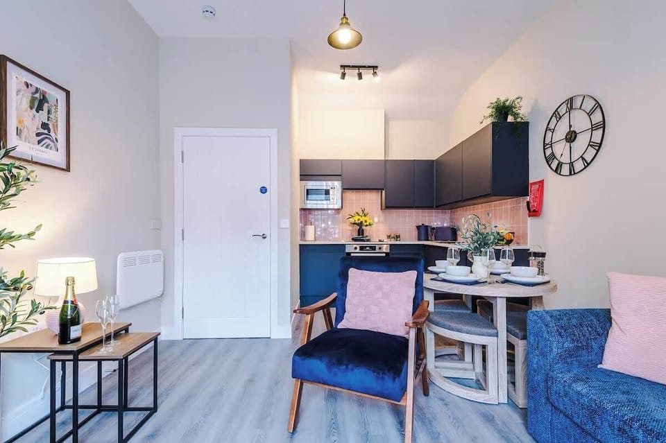 The spacious open-plan living space benefits from a double sofa bed, smart TV, dining area for 4 and a fully equipped kitchen.