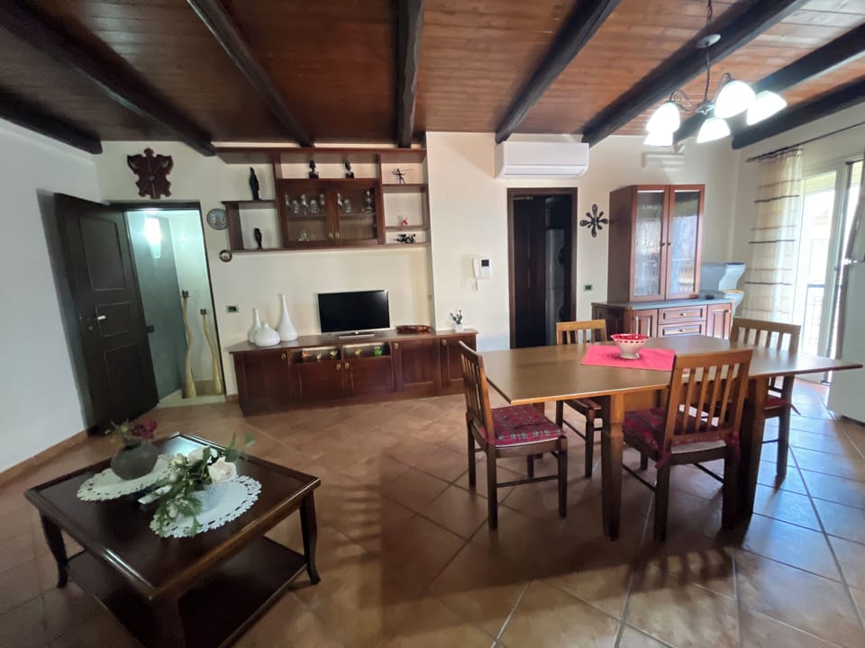 Comfort House, Balcony | Living area | Flat-screen TV