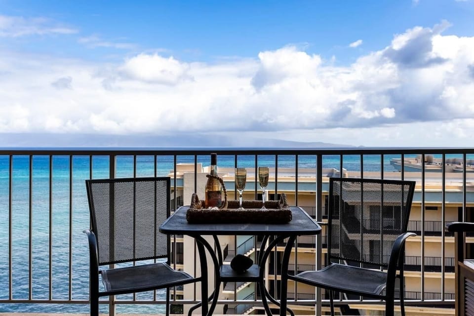 Private lanai with an ocean and surround island views. Cheers to your Maui memories!