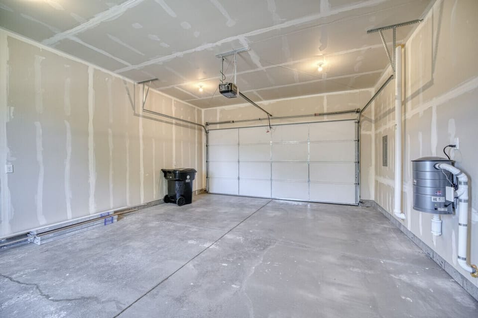 Spacious 2-car garage perfect for secure parking, ideal for Idaho`s cold and snowy weather.