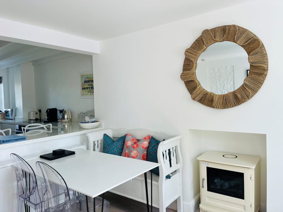 dining area with decorative log burner