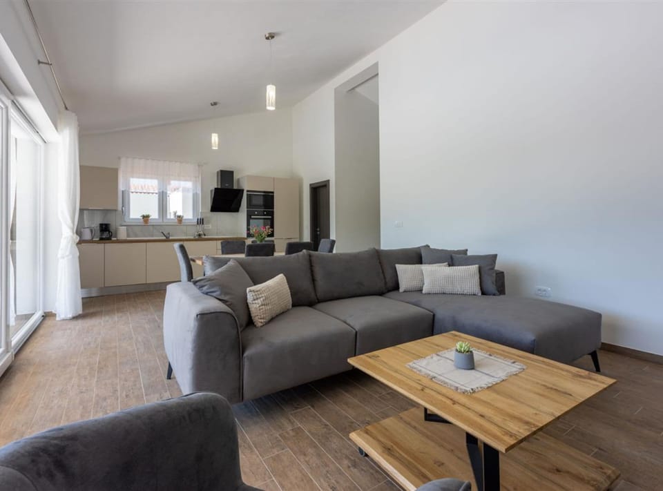 Villa (Three Bedroom Villa with Swiming Pool) | Living room | 32-inch flat-screen TV with satellite channels