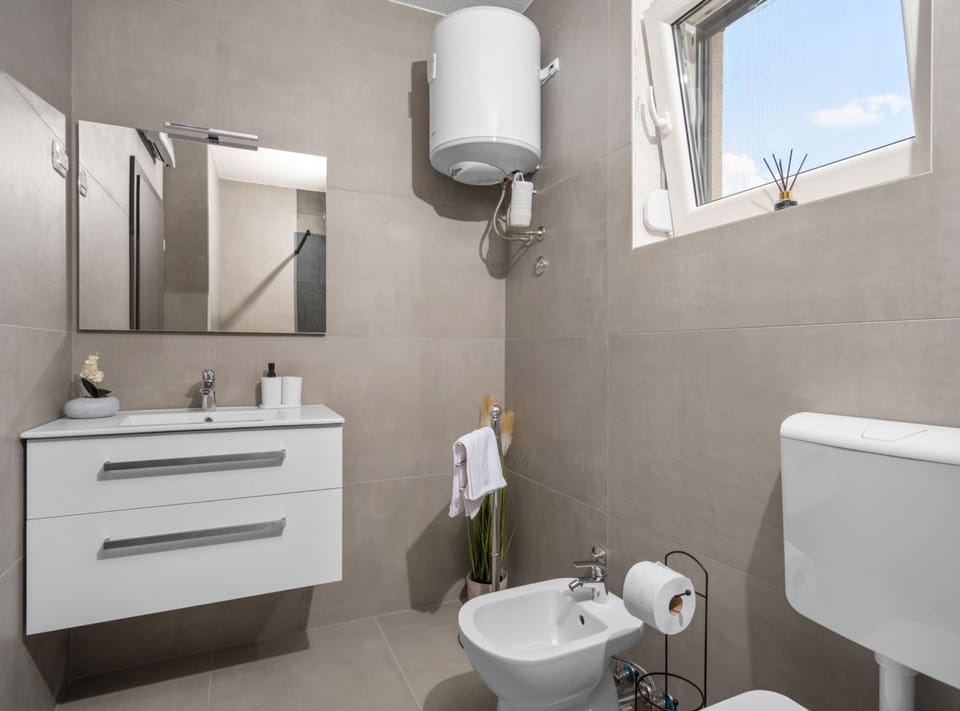 Villa (Villa SABINA - Santalezi - Three Bedr) | Bathroom | Shower, towels