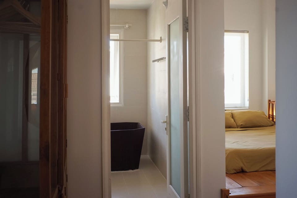 Deluxe Quadruple Room, Non Smoking | Bathroom | Rainfall showerhead, hair dryer, slippers, bidet
