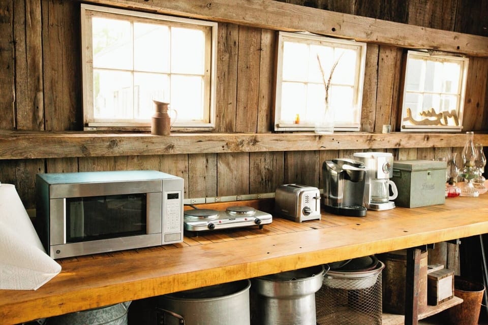Microwave, toaster, coffee maker, it is all there. Super sized pots for lobster and clams.