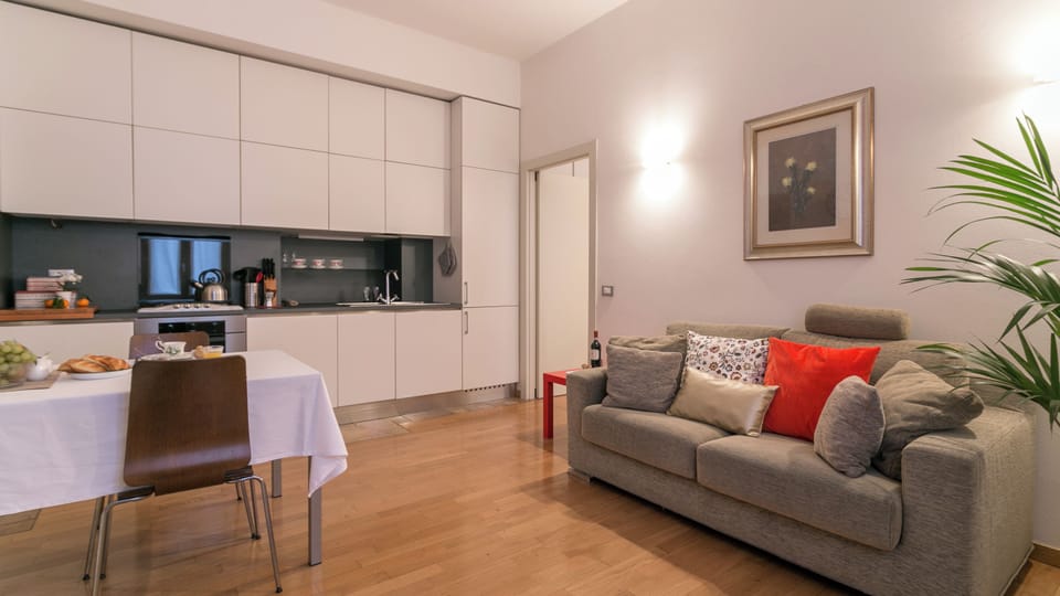 City Apartment | Living area | 37-inch flat-screen TV with digital channels