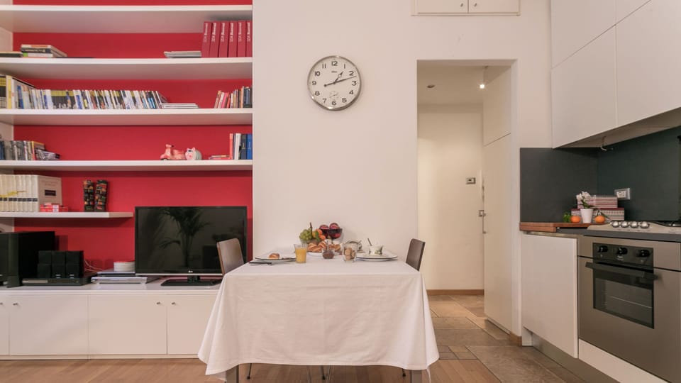City Apartment | Living area | 37-inch flat-screen TV with digital channels