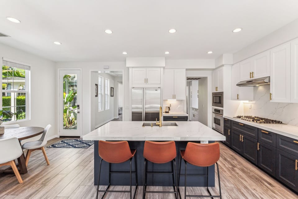 The kitchen island seats three