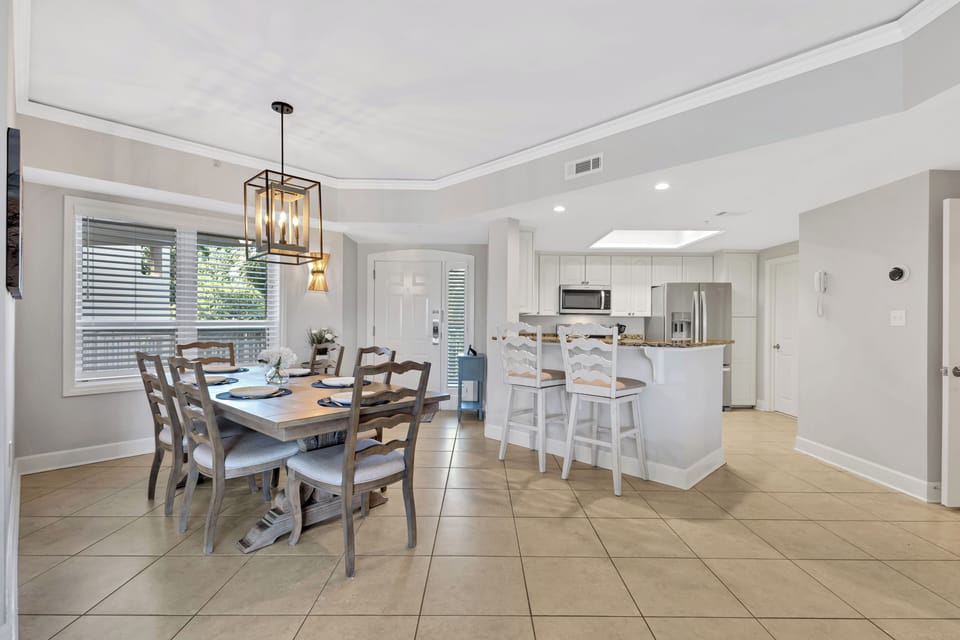 This exceptional beachfront condo features new contemporary furnishings, open concept living and dining areas
