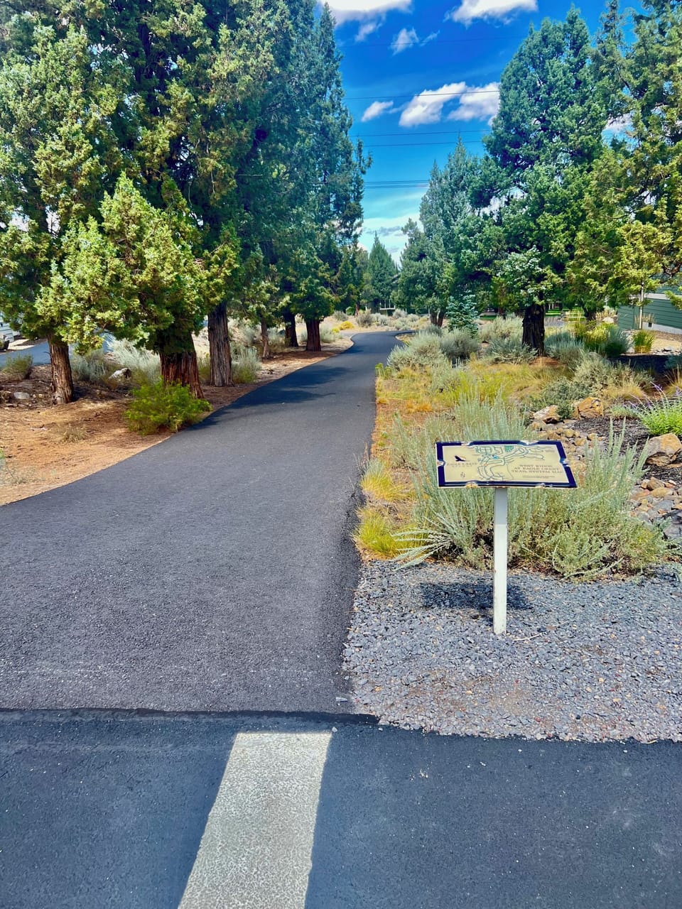 Path next to the house leading to sports center