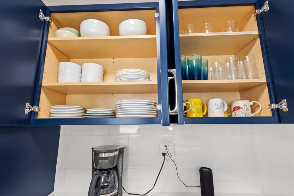 You'll find everything you need to cook and enjoy a meal conveniently stocked in the kitchen.