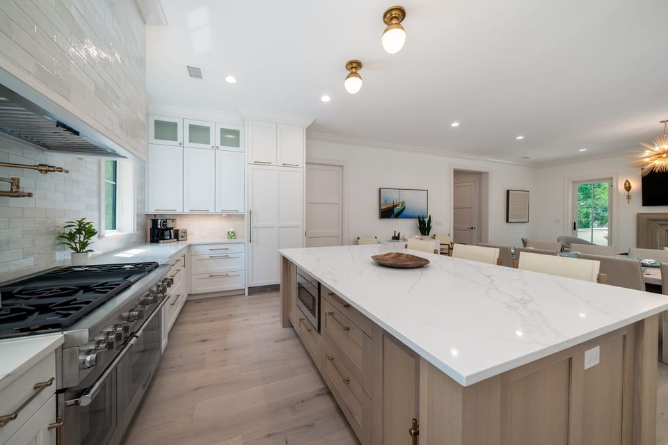 Plenty of work space, custom cabinetry, paneled refrigerator