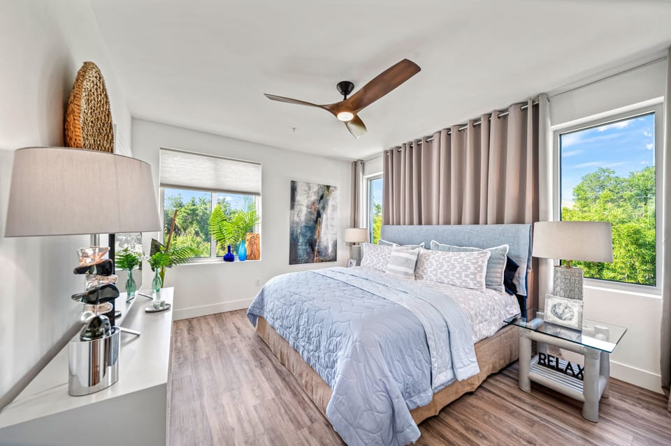 Master Bedroom with Queen Bed, Smart TV, En Suite Bathroom, and Walk-In Closet