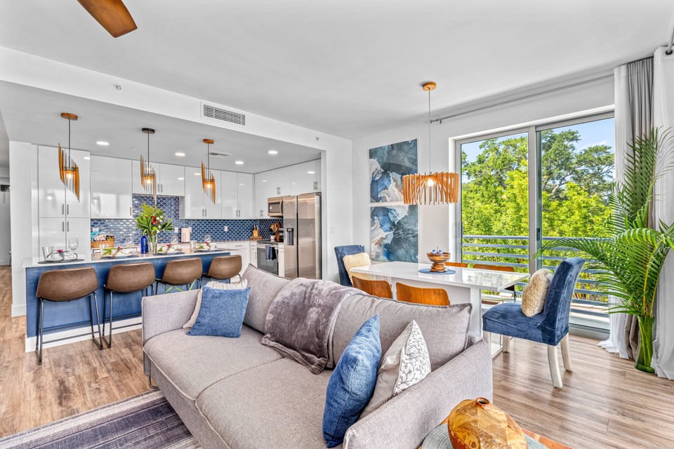 Living Room with kitchen breakfast bar.  Sleeper sofa opens to a queen.