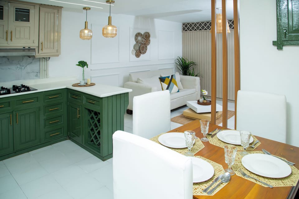 Design Condo, Garden View, Poolside | Living area | 32-inch flat-screen TV with digital channels, pay movies, heated floors