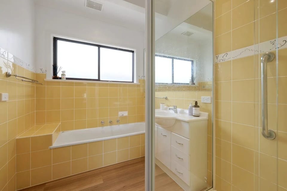 Main bathroom with bath