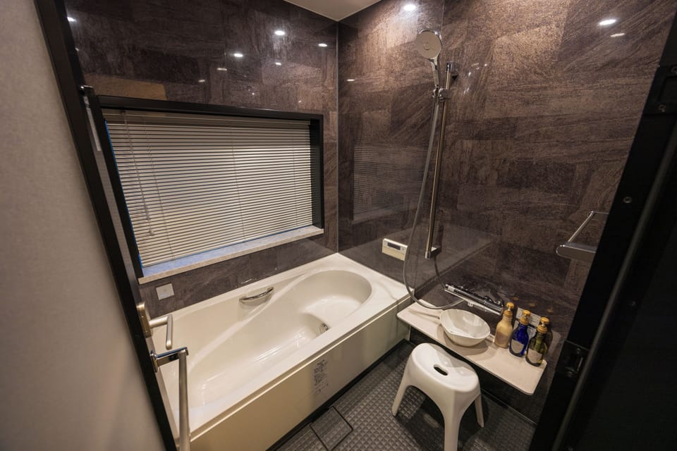 Comfort Condo, 1 Bedroom, Balcony, Garden View | Bathroom | Slippers, bidet