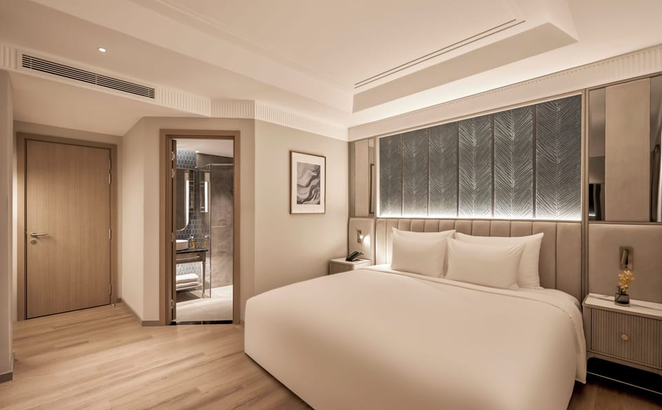 Premium bedding, down comforters, minibar, in-room safe
