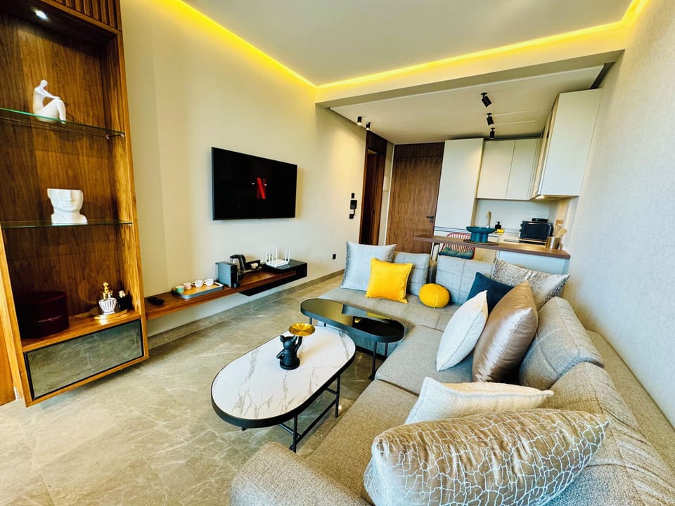 Luxury Apartment, Balcony, City View | Living area | 50-inch LED TV with digital channels, Netflix, streaming services