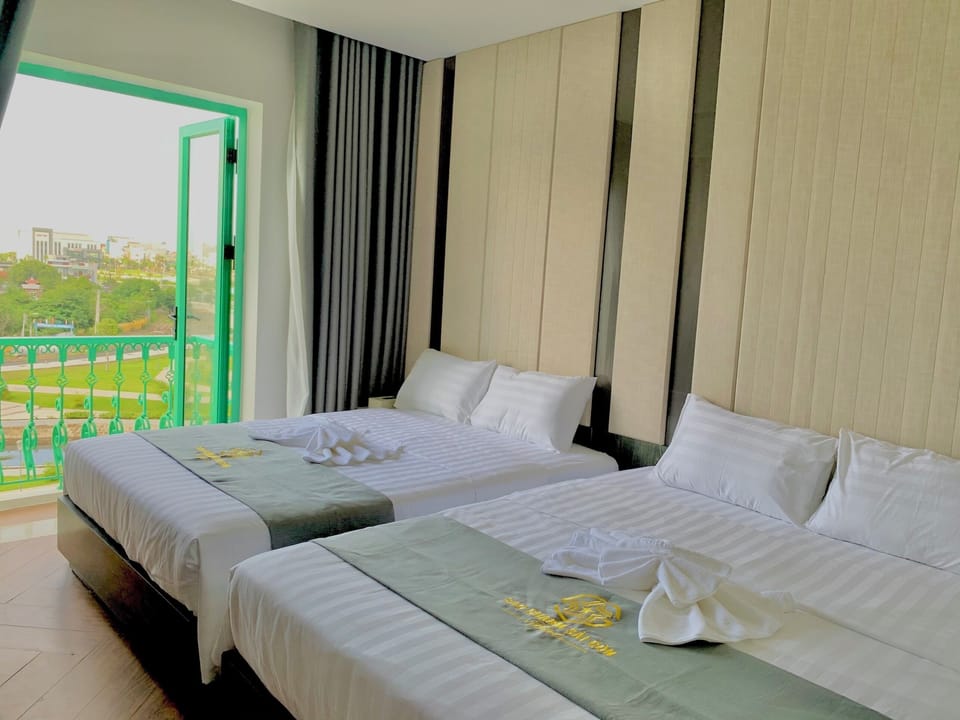 Family Quadruple Room, Lake View | Premium bedding, minibar, desk, laptop workspace