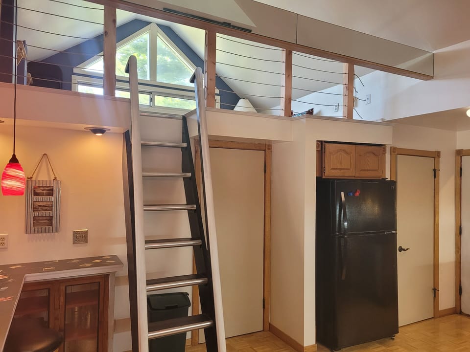 KITCHEN:  The home has a modern kitchen with all major appliances including a dishwasher and a good supply of cooking and dining utensils.