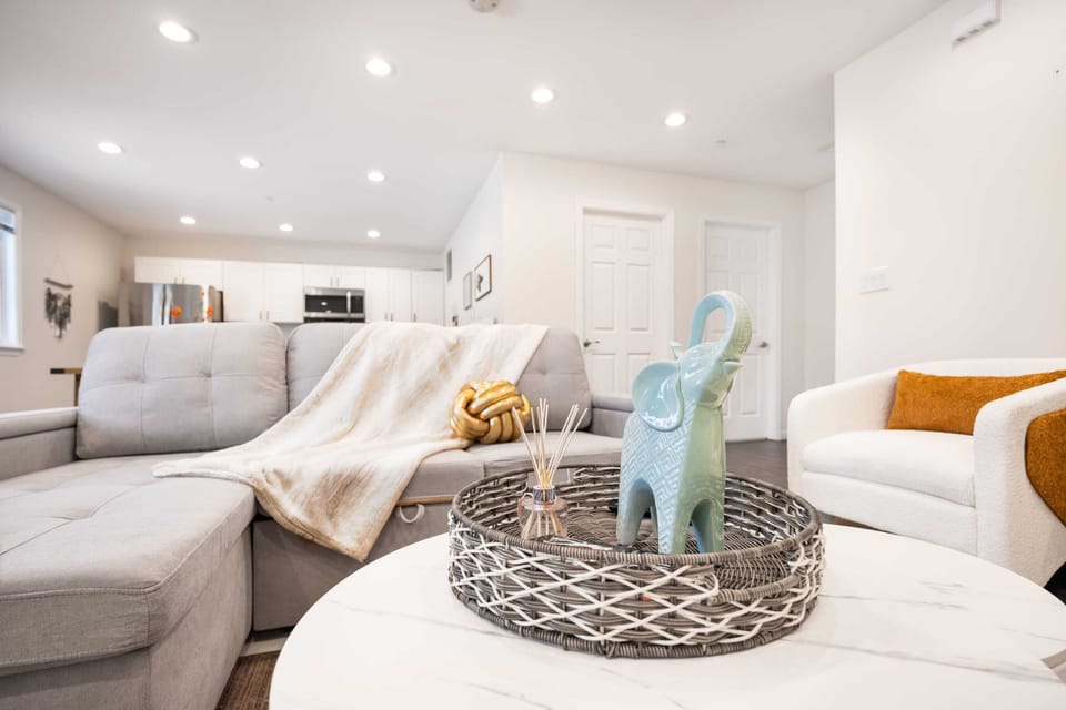 Stylish living room featuring comfortable seating and thoughtful decor, ideal for unwinding after a day of exploring.