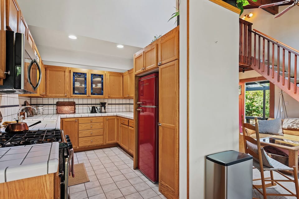 The living and dining areas open to the kitchen and there's oodles of counter space.
