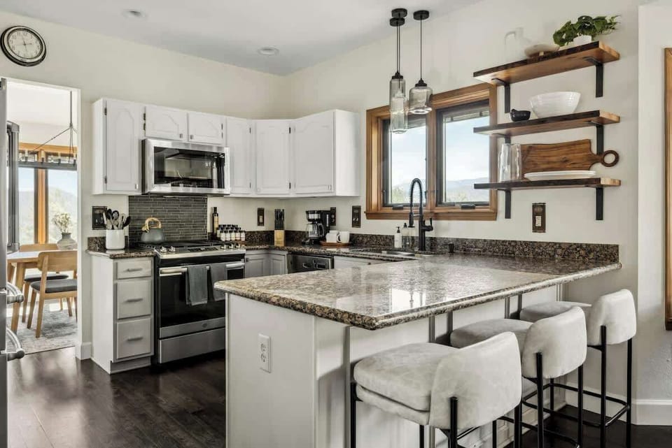 Kitchen with all stainless steel appliances