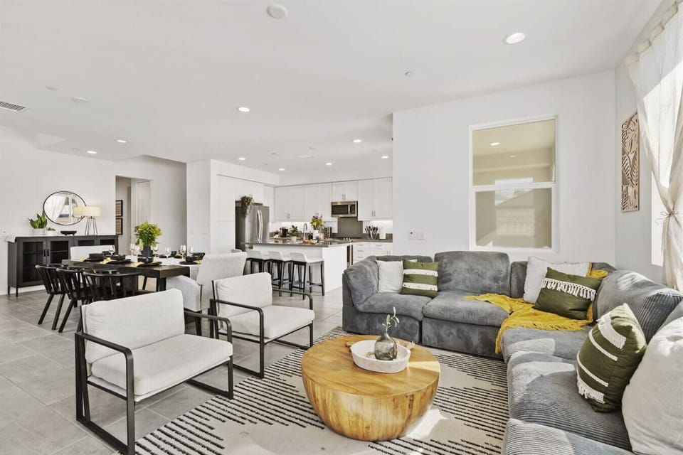 This bright and airy living room is perfect for relaxing after a day of exploring. Sink into the comfy sectional, grab a good book, and enjoy the sunshine streaming through the windows.