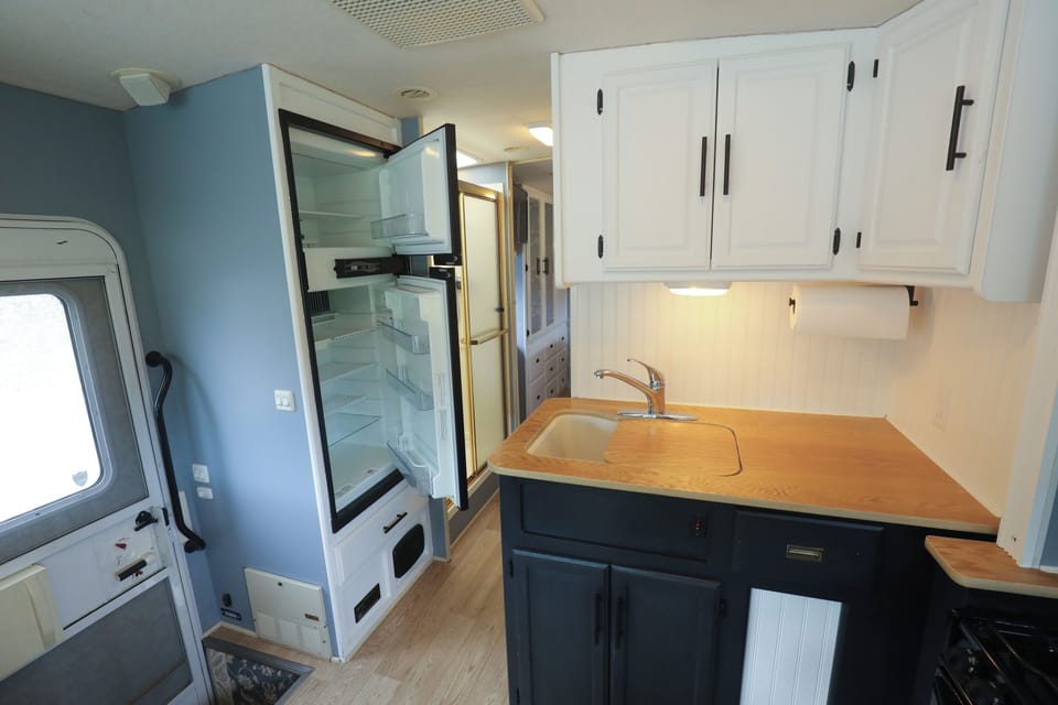 Fridge with freezer.