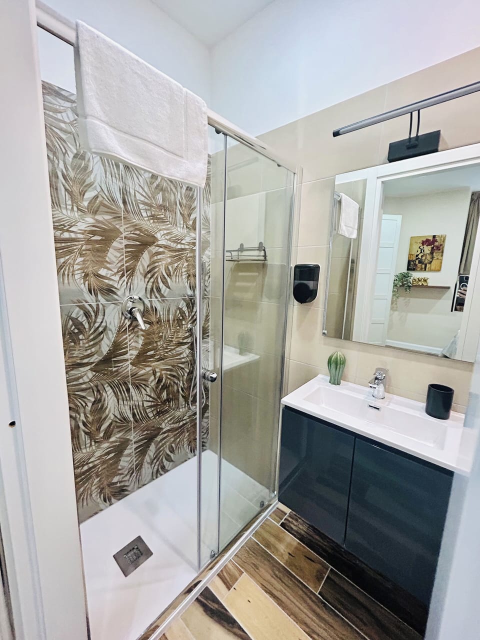 Comfort Room | Bathroom | Rainfall showerhead, hair dryer, towels, soap