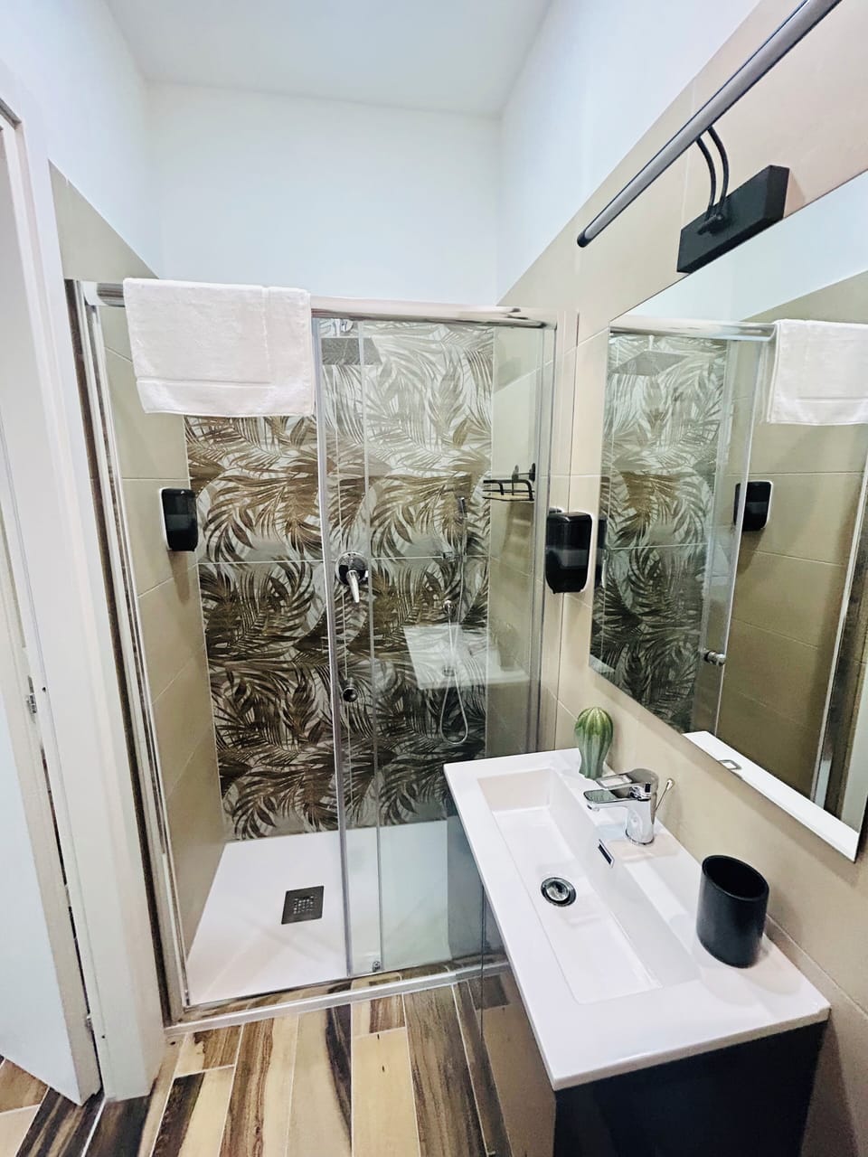 Comfort Room | Bathroom | Rainfall showerhead, hair dryer, towels, soap
