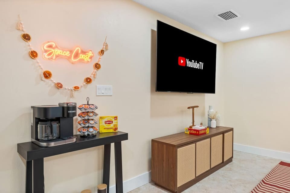 Cocoa Beach Coffee Nook | Warm neon glow, snack shelf & relaxed coastal charm
