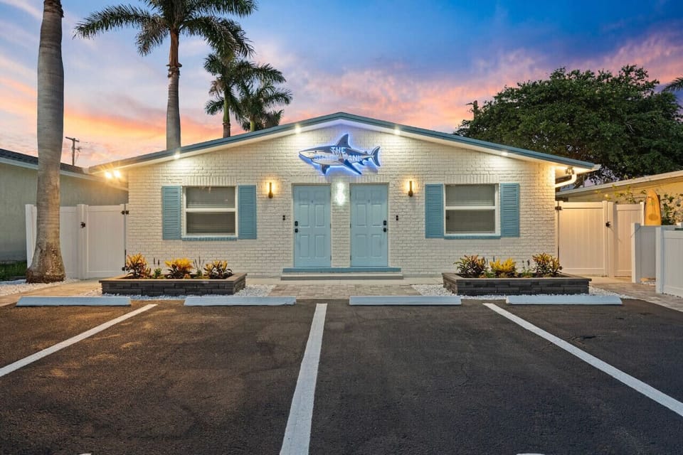 Cocoa Beach Shark Tank Exterior | Bold Signage, Twin Blue Doors & Coastal Charm