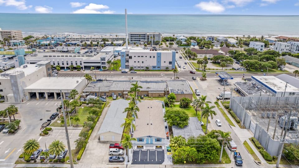 Cocoa Beach Aerial | Coastal Living Meets Urban Flow with Ocean Views, Palm-Lined Streets & Walkable Convenience