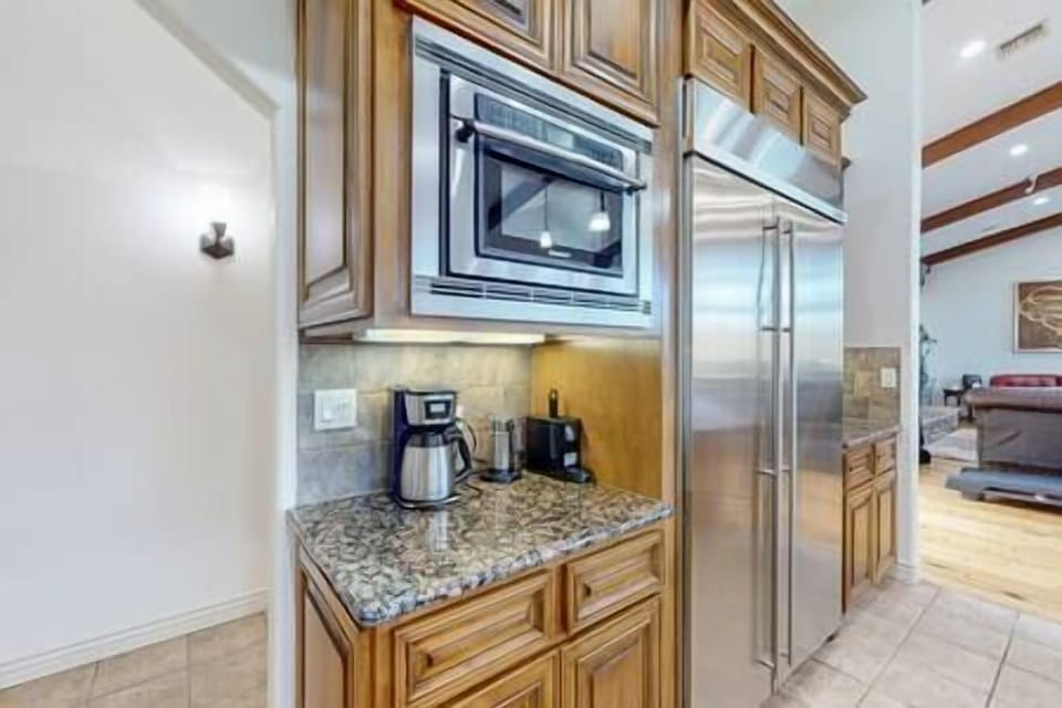 Large built in refrigerator, coffee machine, nespresso maching, frother