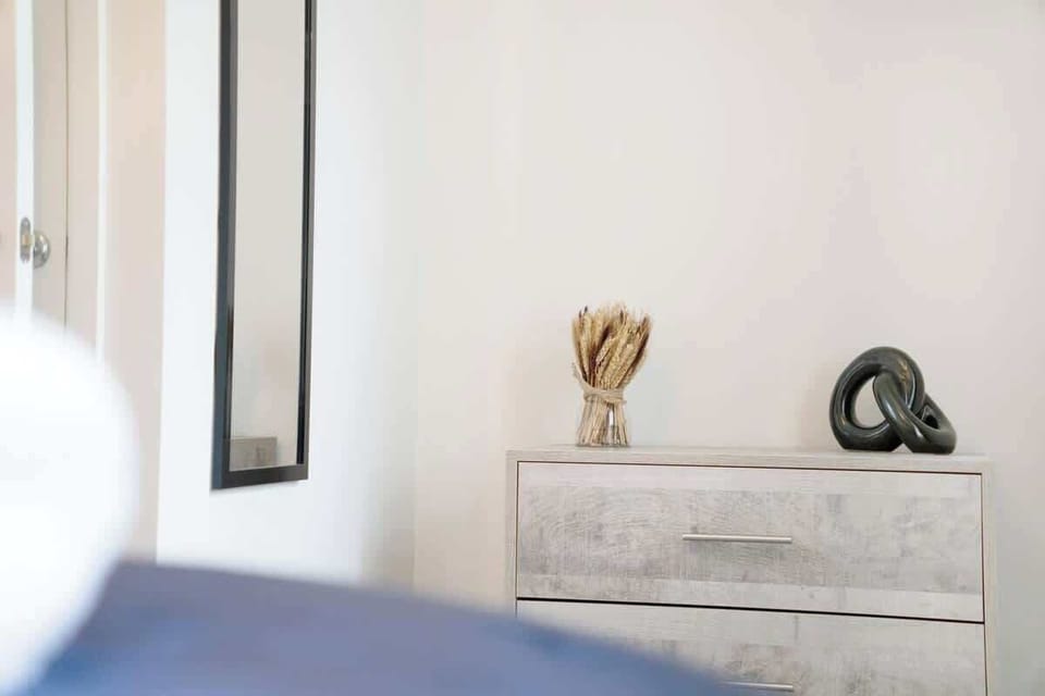 Bedroom 2 benefits from a comfortable double-sized bed with plenty of storage. Bedroom 2 can also be configured to 2 Single beds. 