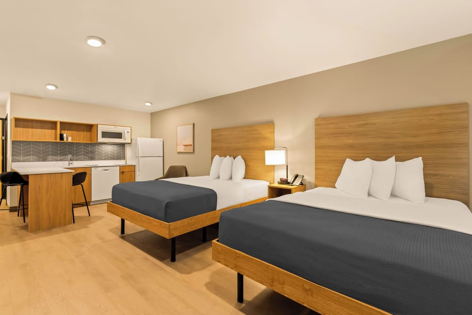 Studio Suite, 2 Queen Beds | Desk, laptop workspace, WiFi (free), individually furnished