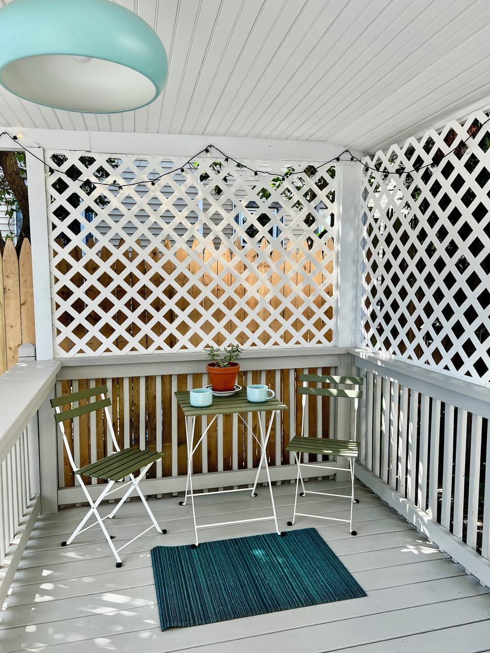 Deck with outdoor table and chairs